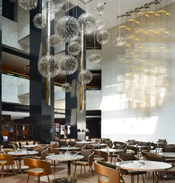 The Hub at the center of hotel lobby where guests can enjoy a wide range of snacks and beverages and a delightful afternoon tea set The Hub at the center of hotel lobby where guests can enjoy a wide range of snacks and beverages and a delightful afternoon tea set