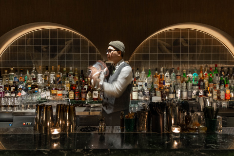 Green Door bartender manoeuvring Green Door bartender manoeuvring
