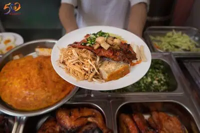 Savor Saigon’s favorite rice dish with grilled pork and pickled veggies.