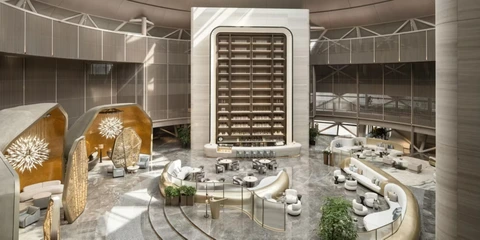 上海滴水湖洲际酒店为何是完美的湖畔度假胜地 3 大堂酒廊位于酒店的中庭,自然光线为金属和大理石设计的环境增添了美感。