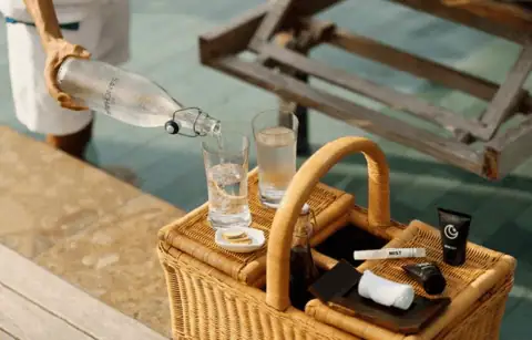 The Sanchaya Review: Luxury Beachfront Escape 21 Committed to responsible tourism, drinking water is bottled on the Estate with a specialized mineralization process.