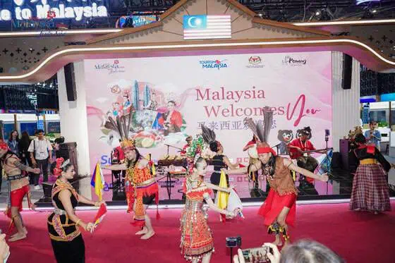 Malaysian performers showcase traditional dance during the opening ceremony of the Malaysia Pavilion at ITB China 2026
