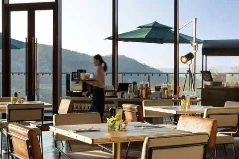 Hotel Indigo Nanjing Garden Expo Review: A Design-Led Quarry Retreat Inside China’s Most Unusual Resort Landscape 11 Dining area at MAI Restaurant