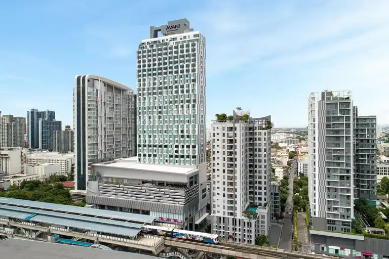 # Avani Sukhumvit Bangkok Strengthens MICE Appeal with Top ASEAN Certification and THB 8 Million Upgrade
### Alternative Headlines
1. Bangkok MICE Competition Heats Up as Avani Sukhumvit Earns Top Venue Certification
2. Why Avani Sukhumvit Bangkok’s Latest Upgrade Matters for Business Travel
3. Bangkok Events Market Gains Momentum with Avani Sukhumvit Venue Investment
## Affiliate Disclosure
Business events and meetings are becoming an increasingly important driver of travel demand across Asia, and Bangkok continues to strengthen its position as one of the region’s leading MICE destinations. Avani Sukhumvit Bangkok has secured top ASEAN and Thailand venue certifications following a THB 8 million investment in event technology and venue enhancements, reinforcing its role in Bangkok’s growing corporate travel sector. This article contains affiliate links. We may earn a commission at no extra cost to you.
## Key Facts
* **Hotel:** Avani Sukhumvit Bangkok
* **Location:** Sukhumvit, Bangkok, Thailand
* **Announcement:** 2026
* **Certification:** ASEAN MICE Venue Standard (AMVS) and Thailand MICE Venue Standard (TMVS)
* **Investment:** THB 8 million
* **Event Space:** 1,492 square metres
* **Key Feature:** New LED event technology and pillarless meeting venues
* **Industry Ranking:** Among Thailand’s top five highest-scoring AMVS-certified meeting venues
## Key Takeaways
* Bangkok strengthens its position as a leading regional MICE hub.
* New event technology supports hybrid and large-scale meetings.
* Direct BTS access improves delegate mobility across Bangkok.
* Corporate travel demand continues driving hotel investments.
* Certified venues provide planners with operational confidence.
## What Is This Development?
Avani Sukhumvit Bangkok has achieved the highest levels of certification under both the ASEAN MICE Venue Standard (AMVS) and the Thailand MICE Venue Standard (TMVS), following a significant investment in venue upgrades and event technology.
The achievement places the hotel among Thailand’s highest-performing certified meeting venues and highlights the increasing emphasis on quality standards within Southeast Asia’s competitive meetings and events sector.
As business travel continues to recover and evolve, meeting planners are placing greater importance on venue reliability, technology integration and accessibility. Certifications such as AMVS and TMVS serve as independent benchmarks that help organisers assess operational quality and service standards.
## Enhanced Event Facilities Target Modern Meeting Demand
The hotel invested THB 8 million to upgrade its event infrastructure, including the installation of new LED display technology throughout its meeting spaces.
Located on the seventh floor, the hotel’s primary event facilities provide 1,492 square metres of dedicated function space. Four pillarless venues with ceiling heights between five and seven metres offer flexible layouts for conferences, product launches, gala dinners, weddings and corporate forums.
The centrepiece of the venue offering is the Grand Chambray Ballroom, which features a large-format 10 x 5.5-metre LED screen designed to support presentations, branding activations and hybrid event formats.
Additional meeting facilities on the eighth floor accommodate smaller gatherings, workshops and executive meetings, while outdoor venues such as The Deck and The Greenhouse provide alternative settings for networking events and private functions.
## Why Does This Matter for Travelers?
The investment reflects a broader shift in business travel, where delegates increasingly expect seamless technology, flexible event formats and convenient transport connections.
For meeting attendees, direct access to Bangkok’s BTS Skytrain network can significantly reduce travel times between hotels, convention centres and commercial districts. This convenience has become an important factor for both international conferences and regional corporate gatherings.
The hotel’s location also provides quick access to shopping, dining and entertainment districts, allowing business travellers to combine work commitments with leisure experiences during their stay.
## How Does This Impact the Travel Industry?
Corporate travel remains a major contributor to hotel revenue throughout Asia-Pacific, particularly in destinations with strong aviation connectivity and established convention infrastructure.
Bangkok continues to compete with regional MICE destinations such as Singapore, Kuala Lumpur and Hong Kong. Investments in certified venues and advanced event technology help strengthen the Thai capital’s position within this competitive landscape.
The latest enhancements at Avani Sukhumvit Bangkok also reflect the growing demand for hybrid meetings, where physical and virtual participation increasingly coexist within the same event.
## Strong Connectivity Supports Bangkok’s MICE Growth
Accessibility remains one of the hotel's key advantages.
Avani Sukhumvit Bangkok is located approximately 30 minutes from Suvarnabhumi Airport and around 10 minutes by car from Bangkok International Trade and Exhibition Centre.
Direct BTS access provides convenient links to major commercial and lifestyle destinations, including Queen Sirikit National Convention Center, Siam Paragon, CentralWorld and Bangkok’s popular Thonglor district.
The hotel is also integrated with Century Sukhumvit Mall, giving delegates immediate access to restaurants, cafés and retail facilities.
## About the Destination
Bangkok remains one of Asia’s most important destinations for meetings, incentives, conferences and exhibitions. The city benefits from extensive international air connectivity, a large hotel inventory and a growing portfolio of convention facilities.
Demand has been supported by Thailand’s tourism recovery, continued airline expansion and increasing interest from regional corporate event organisers. As international business travel continues to rebound, Bangkok is strengthening its position as a preferred gateway for both leisure and corporate visitors.
## Industry Insight
The certification of Avani Sukhumvit Bangkok reflects a broader trend toward quality assurance and technology-led event experiences across Asia’s hospitality sector.
Hotels are increasingly investing in hybrid meeting capabilities, digital production infrastructure and internationally recognised standards to attract event organisers. For travellers, this translates into smoother event experiences and more reliable service delivery. For destinations, it supports competitiveness in the rapidly evolving MICE market.
## Check Availability
Travellers and event planners can compare rates, venue packages and accommodation options across **Booking.com**, **Trip.com**, **Agoda**, **Expedia** and **Klook** before making reservations.
Comparing multiple platforms often helps identify promotional offers, meeting packages and loyalty benefits that may vary between booking channels.
## Travel Tools
For travel gear, booking essentials and travel products frequently used by travellers, visit:
https://www.paullotravel.com/products-we-recommend/
## Travelers Interested in This Story May Also Enjoy:
* Bangkok’s Growing Role as Asia’s Leading MICE Destination
* How Hybrid Meetings Are Reshaping Hotel Event Spaces Across Asia
* Thailand’s Business Travel Recovery Gains Momentum
* Best Hotels Near BITEC Bangkok for Corporate Events
* Why Southeast Asia Is Seeing Strong Growth in Convention Tourism
---
## SEO Metadata
**Meta Title:**
Avani Sukhumvit Bangkok Earns Top ASEAN MICE Certification
**Meta Description:**
Avani Sukhumvit Bangkok secures top ASEAN MICE certification after a THB 8 million venue upgrade, strengthening Bangkok’s business travel appeal.
**URL Slug:**
avani-sukhumvit-bangkok-asean-mice-certification-upgrade
**Primary Keyword:**
Avani Sukhumvit Bangkok
**Secondary Keywords:**
* Bangkok MICE venue
* ASEAN MICE Venue Standard
* Thailand MICE Venue Standard
* Bangkok business travel
* Bangkok meetings and events
* BITEC Bangkok
* Thailand convention tourism
* Bangkok conference hotels
---
## Discover + AI Overview Signals
**Topic Category:** Hotel & MICE Industry News
**Geographic Focus:** Bangkok, Thailand
**Travel Sector:** Hospitality, MICE, Business Travel
**Article Type:** Industry Development
**Target Audience:** Travel professionals, meeting planners, hotel industry executives, business travellers
---
## Image SEO
**Image Alt Text:**
Avani Sukhumvit Bangkok ballroom with new LED event technology and certified MICE facilities
**Image Caption:**
Avani Sukhumvit Bangkok has upgraded its event facilities and earned top ASEAN and Thailand MICE venue certifications.