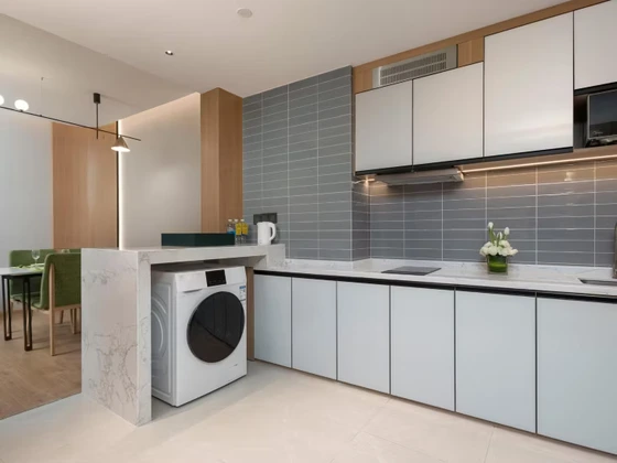 Kitchen-equipped suites with laundry facilities at Holiday Inn & Suites Wuhan