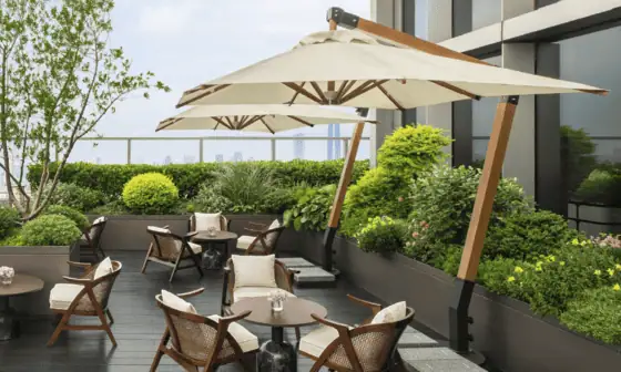 The Ritz-Carlton Wuhan Lobby Lounge Terrace with views of the Yangtze River and city skyline