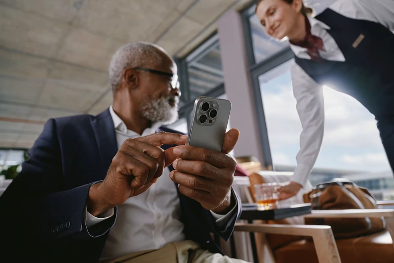 Priority Pass airport lounge network and Priority Pass+ app expansion