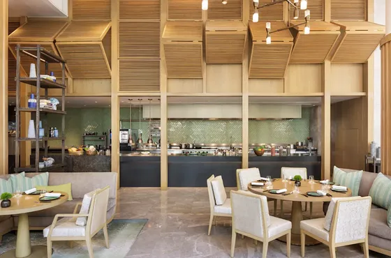 Front Room Thai restaurant at Waldorf Astoria Bangkok with its lantern-filled interior and open kitchen