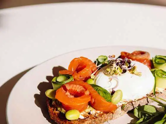 Eggs Benedict with salmon on bread at Harper's restaurant