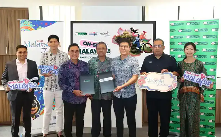 Tourism Malaysia and AirAsia MOVE representatives at the Oh Sem Malaysia! partnership announcement at Wisma Capital A.