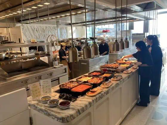 The open kitchen at Hillside prepares breakfast dishes for hotel guests