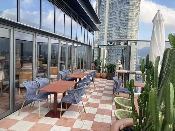 Swim Club's indoor and outdoor seating areas