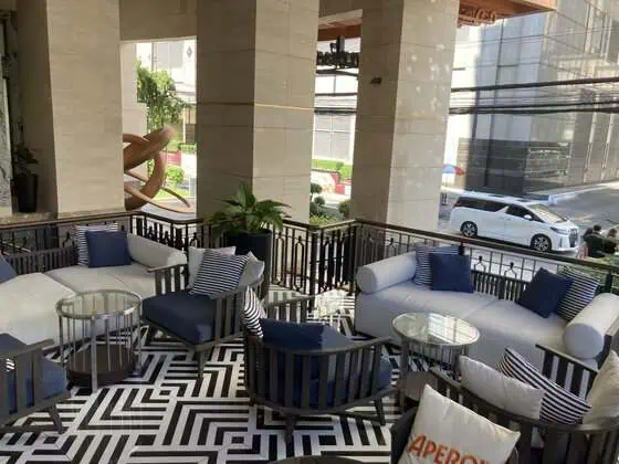 Outdoor seating at Larder & Lounge in Radisson Hotel Chateau de Bangkok