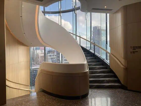 Staircase on the 15th-floor Reception level connecting Hillside all-day dining restaurant one floor below and the ballroom and meeting facilities one floor above.